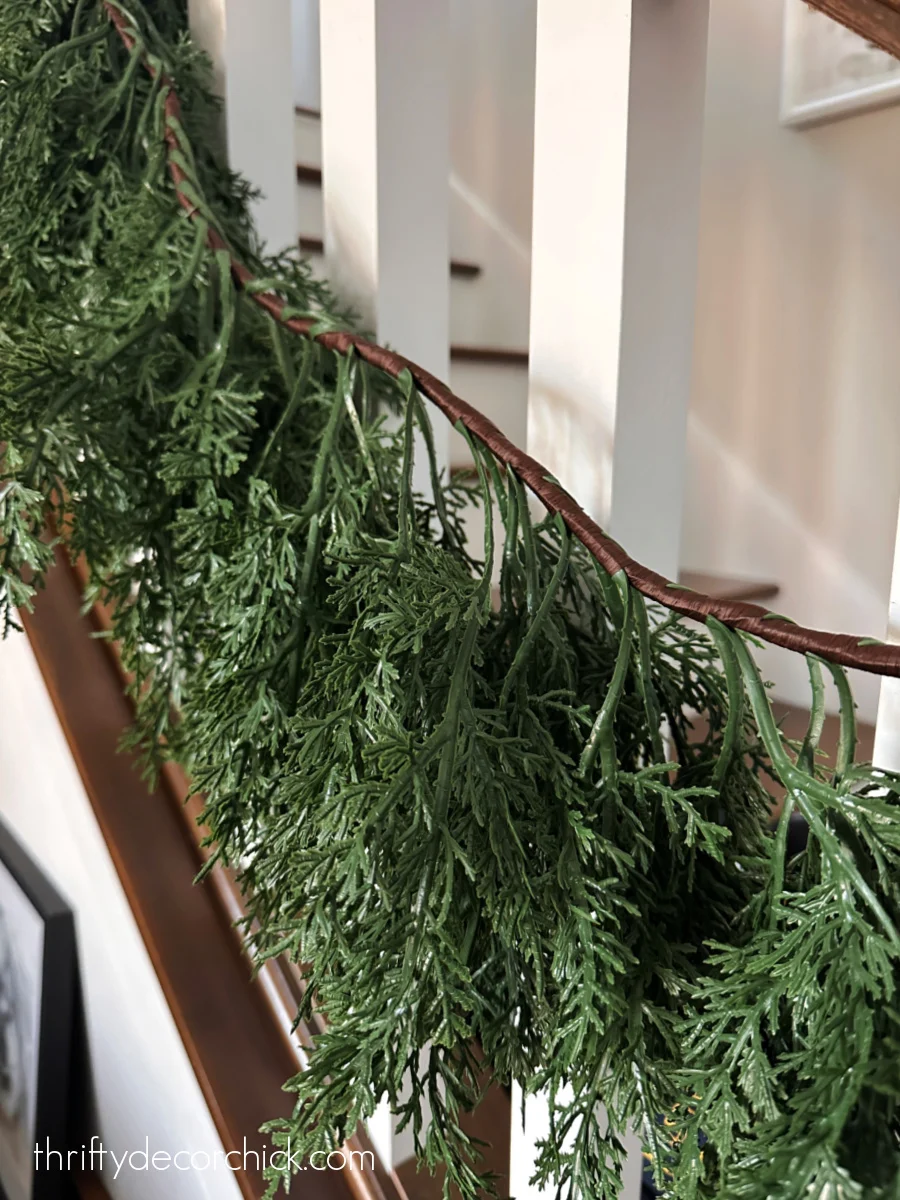 draping cedar garland from railing